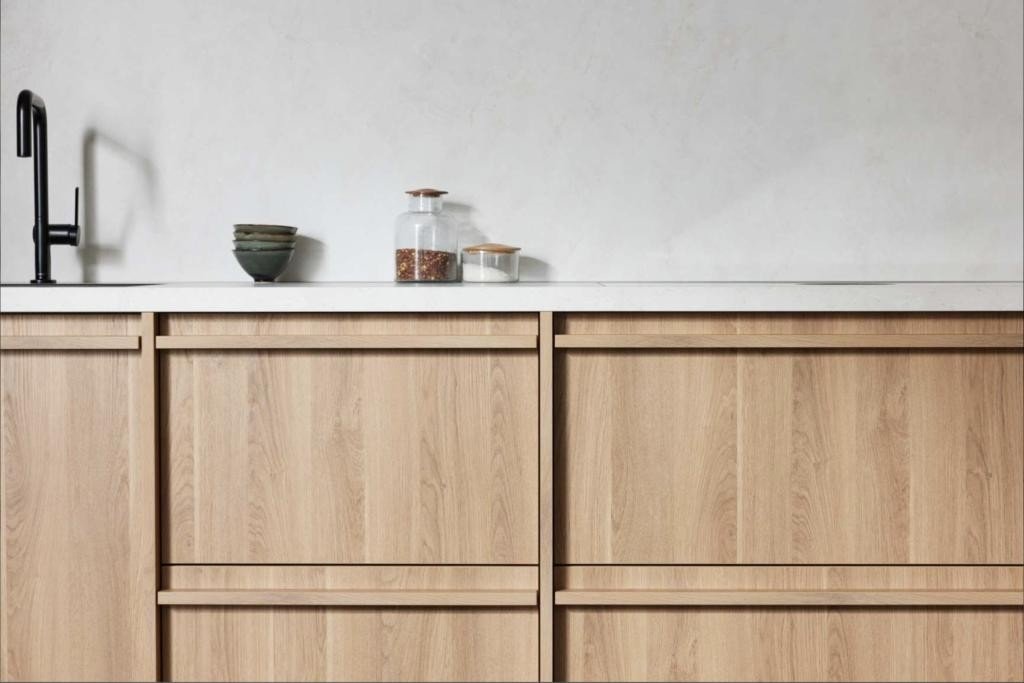 Wabi sabi kitchen open shelving with handmade ceramics and simple everyday dishes